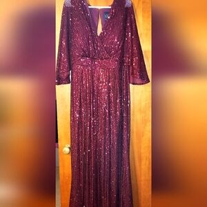 Nightway size 16W Burgandy sequin gown with shorts sleeves and a keyhole back
